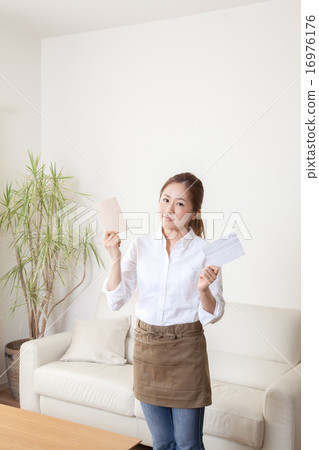 Female full-time coordinator introducing materials of interior decor 16976176