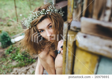 Beautiful girl spying on someone 16979891