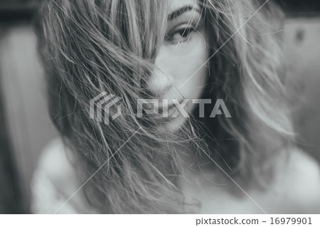 Portrait of a beautiful red-haired girl 16979901