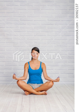 The girl is engaged in yoga The girl is engaged in yoga 16982137