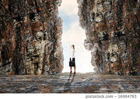 Business person in cave 16984765