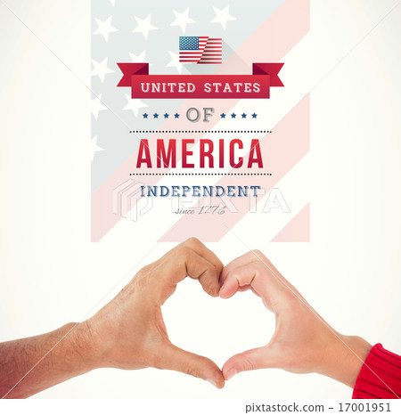 Composite image of couple making heart shape with hands 17001951