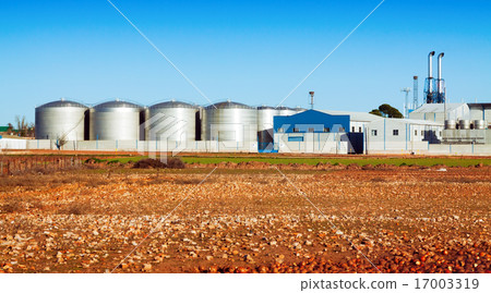 industry plant with store buildings near field 17003319