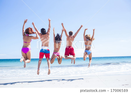 Happy friends jumping together Happy friends jumping together 17006589
