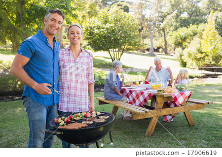 Happy family having picnic in the park 17006619