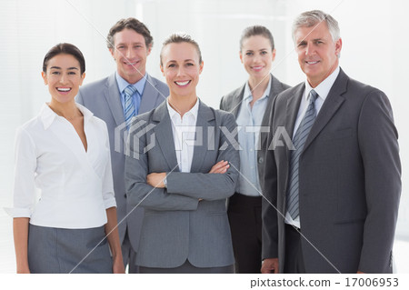 Business team looking at camera 17006953
