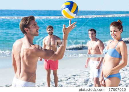 Friends playing volleyball Friends playing volleyball 17007020