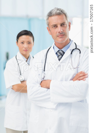 Confident male and female doctors 17007165