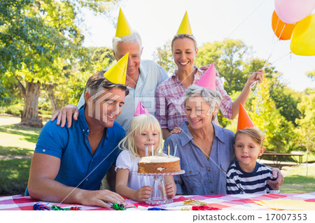 Happy family celebrating a birthday Happy family celebrating a birthday 17007353