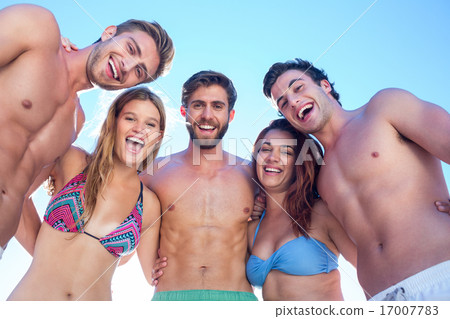 Happy friends smiling at camera 17007783