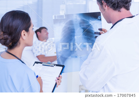 Doctors checking patients xray 17007845