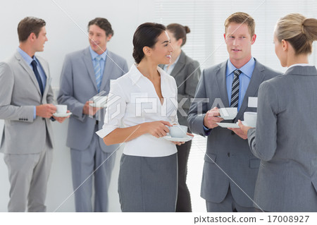 Stock Photo: Business people drinking cup of coffee