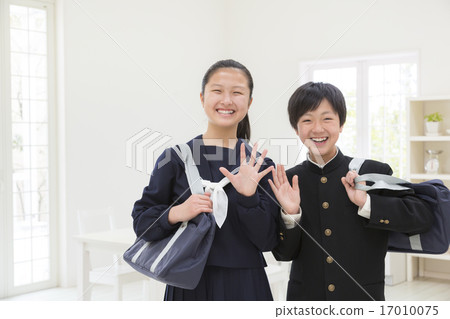 Middle school girls waving hands Middle school girls waving hands 17010075