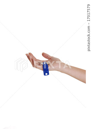 A hand with a key. A hand with a key. 17017579