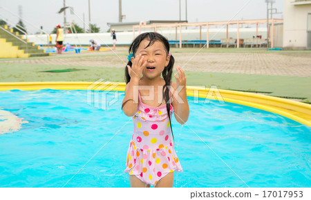 Girls playing in the pool Girls playing in the pool 17017953