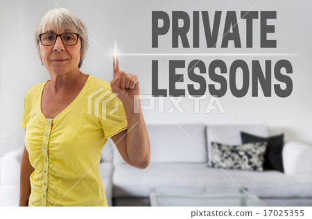 Private Lessons touchscreen is shown by senior Private Lessons touchscreen is shown by senior 17025355