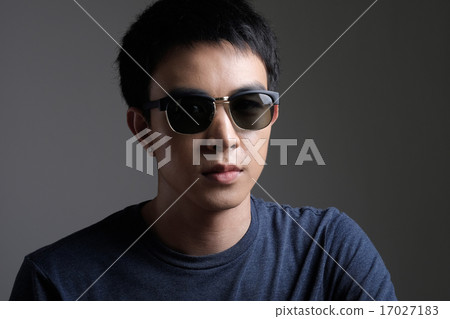 Asian man portrait with retro sunglasses Asian man portrait with retro sunglasses 17027183