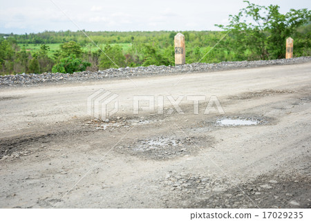 rough bumpy stone road in rural 17029235