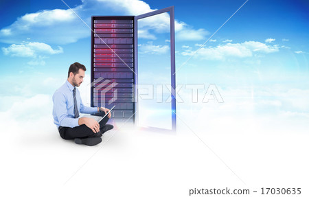 Composite image of cheerful businessman sitting on the floor usi Composite image of cheerful businessman sitting on the floor usi 17030635