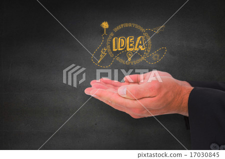 Composite image of businessman holding his hands out 17030845