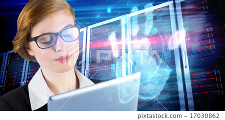 Composite image of redhead businesswoman using her tablet pc Composite image of redhead businesswoman using her tablet pc 17030862