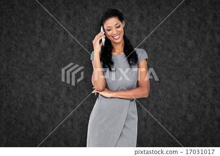 Composite image of businesswoman on the phone 17031017
