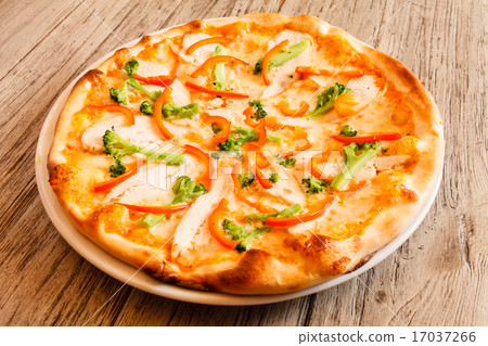 pizza on wooden background 17037266