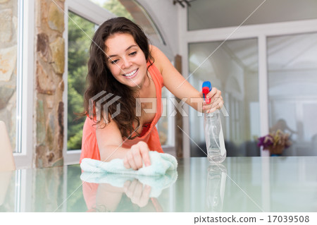 Girl cleaning table 17039508