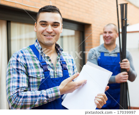 Two workers at factory Two workers at factory 17039997