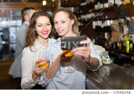 young adults making selfie 17040246