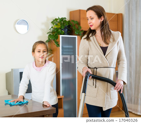 Woman and girl cleaning at home Woman and girl cleaning at home 17040326