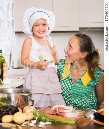 Mother with daughter cooking Mother with daughter cooking 17040450