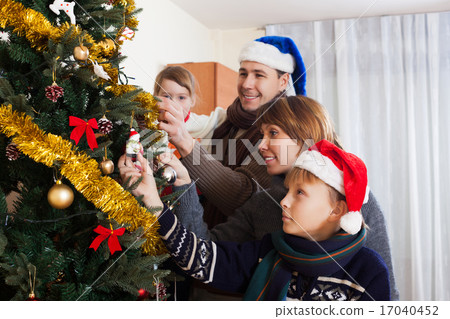 Happy parents with children Happy parents with children 17040452