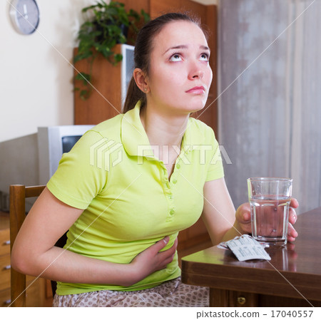 Unhappy woman having stomach aches 17040557