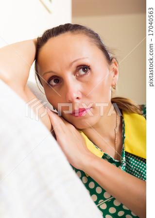 sad middle-aged woman sad middle-aged woman 17040563