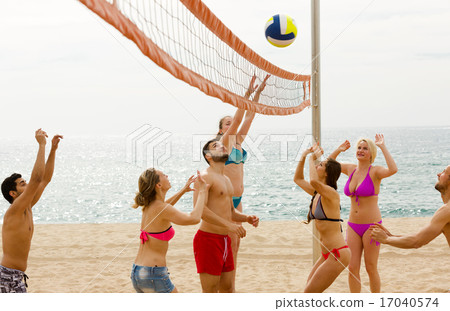 Friends playing volleyball 17040574