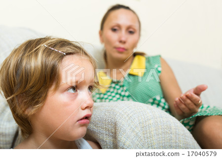 Crying child and mother having quarrel 17040579