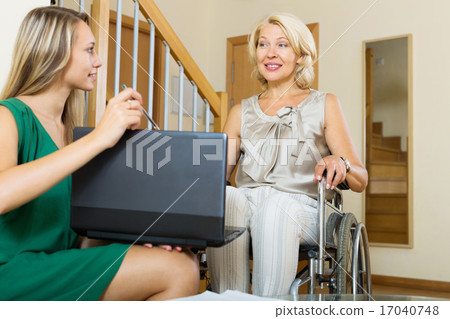 Happy woman in wheelchair 17040748