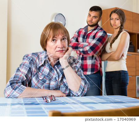 Home conflict at young family with mother Home conflict at young family with mother 17040969