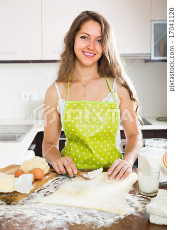 Housewife cooking at home kitchen 17041120