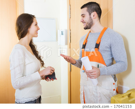 Happy girl meeting workman 17041153