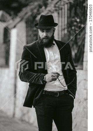 rich man with a beard, thinking about business rich man with a beard, thinking about business 17046603