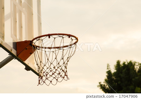 silhouette of a basketball hoop, under the sunset. silhouette of a basketball hoop, under the sunset. 17047906