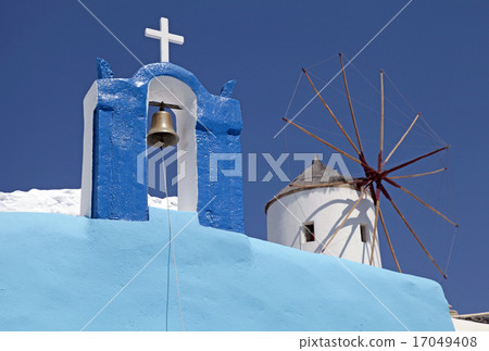 bell tower and windmill in Oia , Santorini, Greece bell tower and windmill in Oia , Santorini, Greece 17049408