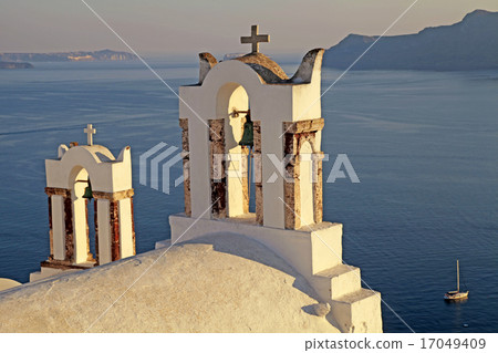 Bell tower above the beautiful blue sea, Oia Bell tower above the beautiful blue sea, Oia 17049409