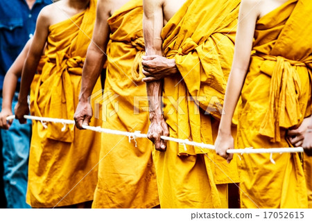 Monks stand in line to get offerings Monks stand in line to get offerings 17052615