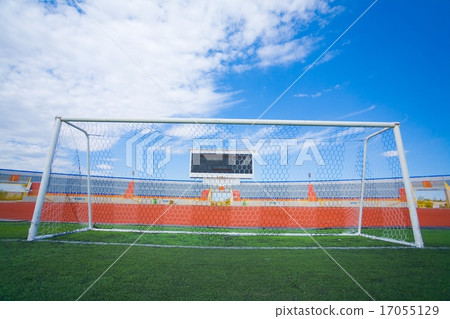 STADIUM - Football field with goal and tablo on blue sky 17055129