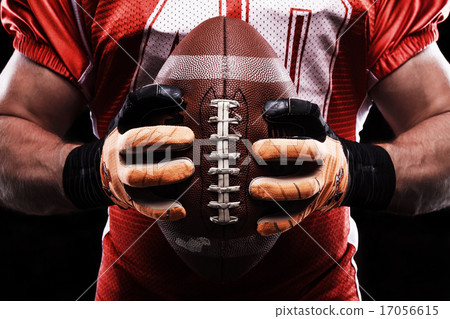 Sportsman holding rugby ball Sportsman holding rugby ball 17056615