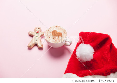 Cup of coffee with heart shape and gingerbread Cup of coffee with heart shape and gingerbread 17064623