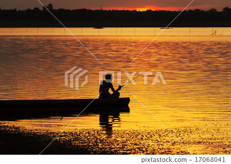 Silhouette Fishermen fishing on a boat Silhouette Fishermen fishing on a boat 17068041